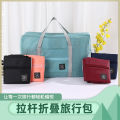 Manufacturers wholesale Internet celebrity portable large capacity luggage storage bag moving travel folding trolley storage bag. 