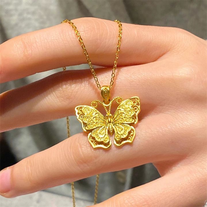 Vietnamese sand gold filigree butterfly pendant, national trend