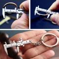 Portable Mini Vernier Caliper Keychain Mini Metal Ruler Car Key Chain Movable Vernier Caliper Ruler Model Keychain Keyring Gift.