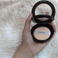 Nirvana Color Mattifying and Poreless Pressed Powder - Light Beige. 
