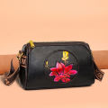 Ethnic style embossed painted mom bag female 2024 new multi-layer one-shoulder crossbody large-capacity pillow bag.