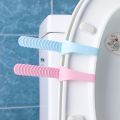 Adjustable squat toilet cover toilet handle. 