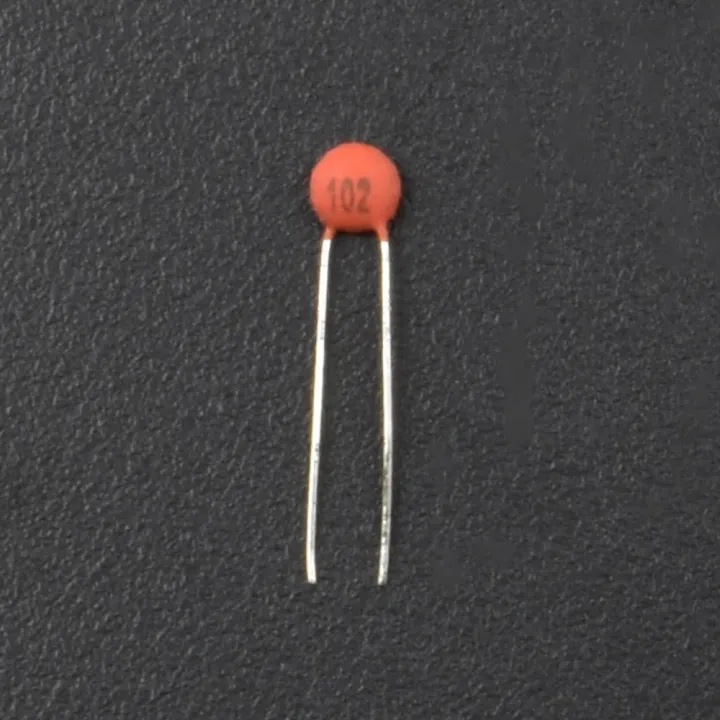 25Pcs-%20102%2050V%20CERAMIC%20Capacitor%20Mini%20Ceramic%20Capacitor%201nF%2050V%20102%20Ceramic%20Disc%20Capacitor%20Non-Polarized%20Through%20Hole%202%20Pin%20Leads%20Connections%20Leg%20-%20Image%203