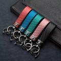 Automotive carbon fiber pattern fashion long metal key chain automotive leather key chain spring ring horseshoe buckle. 