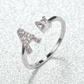 Cross border amazon new rose gold letter white diamond open ring hand ornament men's and women's personality unique ring wholesale. 