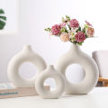 Nordic Round Hollow Ceramic Vase Donut Vase Desktop Decoration Home Decoration jingu. 