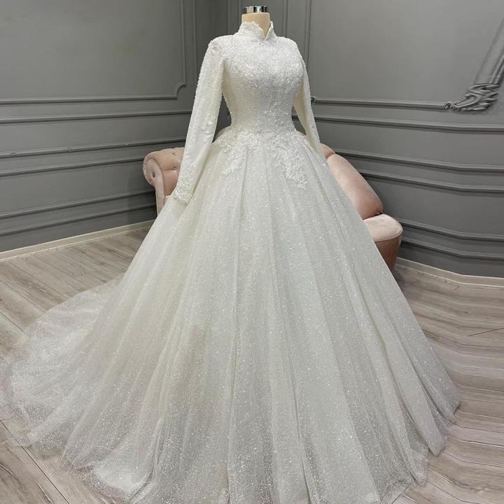 sachin and babi light blue dress How to Achieve a Luxe Wedding Look on a Smart Budget: 8 Insider FAQs from  Bridal Stylists