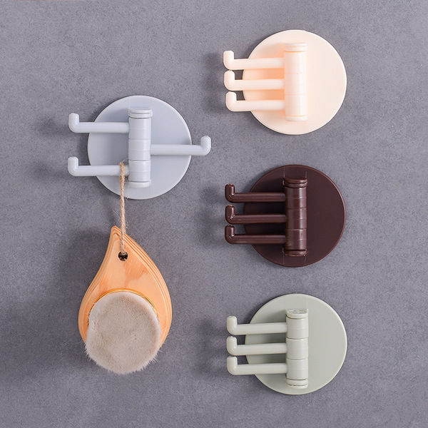 Multifunctional bathroom wall shelf free punching seamless trace rack rotating hook strong 3 branch rotating sticky hook