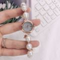 New Japanese and Korean Style in Women's Special-Interest Design Elegant Pearl Watch Creative Drawstring Student's Watch Personalized Bracelet Watch. 