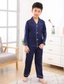 Sleep in Style: Kids Pure Silk Pajama Set for Sweet Dreams.