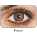 Freshlook Honey contact lens.