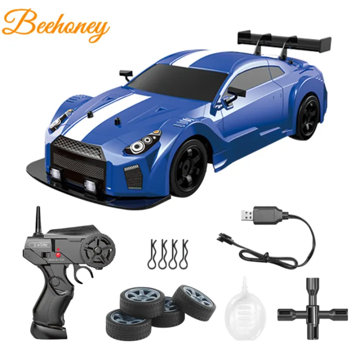 1:16%20Remote%20Control%20Car%20Spray%20Drift%20High-speed%20Rechargeable%20Off-road%20Vehicle%20With%20Light%20For%20Children%20Gifts%20-%20Image%202