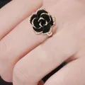 J622 Yiwu factory direct sales South Korea imported jewelry diamond black rose open ring wholesale wholesale. 