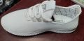 School shoes for boys with soft rubber sool and white.