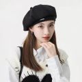 Black beret new women's autumn and winter Japanese face show small woolen octagonal hat ins painter hat big head hat.