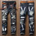 new men jeans ripped European style cotton denim hip hop patchwork fashion jeans for men patch pants holes trousers spray lacquer navy blue. 