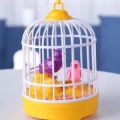 Singing and Chirping Bird Toy in Cage Realistic Sounds and Movements Sound Activated Chirp Toy Electronic Simulation Bird Cage Toy.