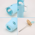 32 Oz Glass Tumbler with Lid and Straw, Glass Water Bottles with Handle, Glass Cup with Silicone Sleeve,Cup Holder Easy to Use Reusable Blue. 