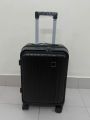 Matte Black Durable Hard-Shell Carry-On Spinner Lightweight ABS Cabin Luggage with Dual-Tube Telescopic Handle. 