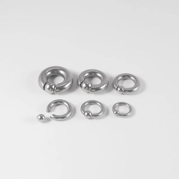 316%20Stainless%20Steel%20Body%20Piercing%20Earrings%20Black%20Gold%20Color%20Spring%20Action%20Captive%20Bead%20Ring%20CBR%202G%204G%206G%208G%200G%2000G%20Body%20Jewelry%20-%20Image%202