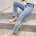 Girls stretch jeans 2021 spring new children's clothing Korean slim fit foreign bow bell pants.