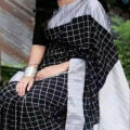 Checkered Elegance with the Black and White Cotton Dhupian Check Saree - A Stylish Choice for All Seasons and Casual Wear. 