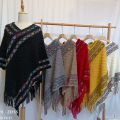 Douyin same style 2023 Spring and Autumn New Ethnic Style Pullover Irregular Retro Tassel Cloak Shawl Factory Direct Sale. 