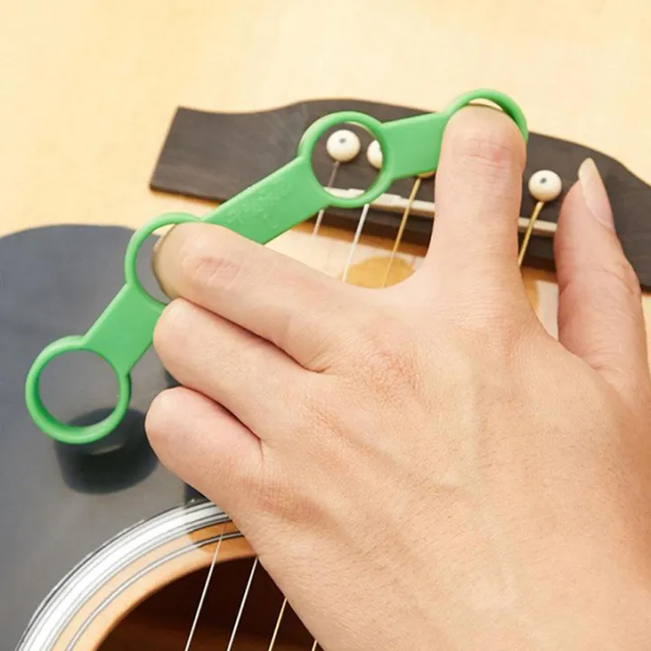 Guitar%20Extender%20Plastic%20Musical%20Finger%20Extension%20Instrument%20Finger%20Strength%20Creek%20-%20Image%205