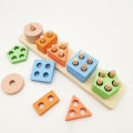 Wooden geometric building blocks for early childhood education. Shape matching, color recognition classification, and assembly five sets of pillar toys. 