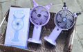 Handheld and Travel-friendly USB Rechargeable Mini Fan with Popular Cartoon Shape.