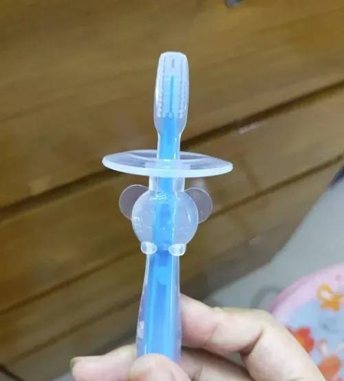 Baby%20Soft%20Silicone%20Bristles%20Teether%20Care%20Training%20Toothbrush%20(1%20pcs/Multi%20Color)%20-%20Image%203