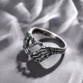 Vintage Punk Skull Hand with Heart-Shaped Ring for Men Women Hip Hop Gothic Skeleton Hand Ring Accessories Jewelry Gifts.