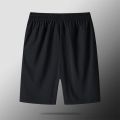 2023 Summer New Solid Color Loose Casual Thin Style Knee Length Pants Man Elastic Waist Pockets Zipper Street Motion Shorts. 