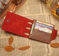 Men's Leather Wallet with Button and Accordion Design.