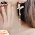 Lady Bling Rhinestone Inlaid Butterfly Long Tassel Faux Pearl Drop Stud Earrings. 