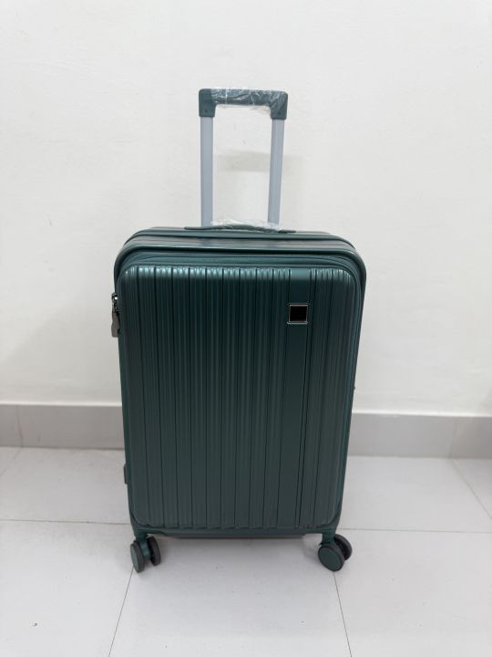 Elegant Forest Green Hard-Shell Spinner Suitcase - Lightweight ABS Carry-On Luggage with Ribbed Finish and Telescopic Handle