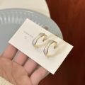 925 silver needle Korean drip glaze C-type light luxury niche simple design sense Korean high-end temperament earrings women's earrings. 