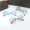 Qianai new fashion hipster cut edge sunglasses women's irregular fashion rimless ocean piece sunglasses driving mirrors.