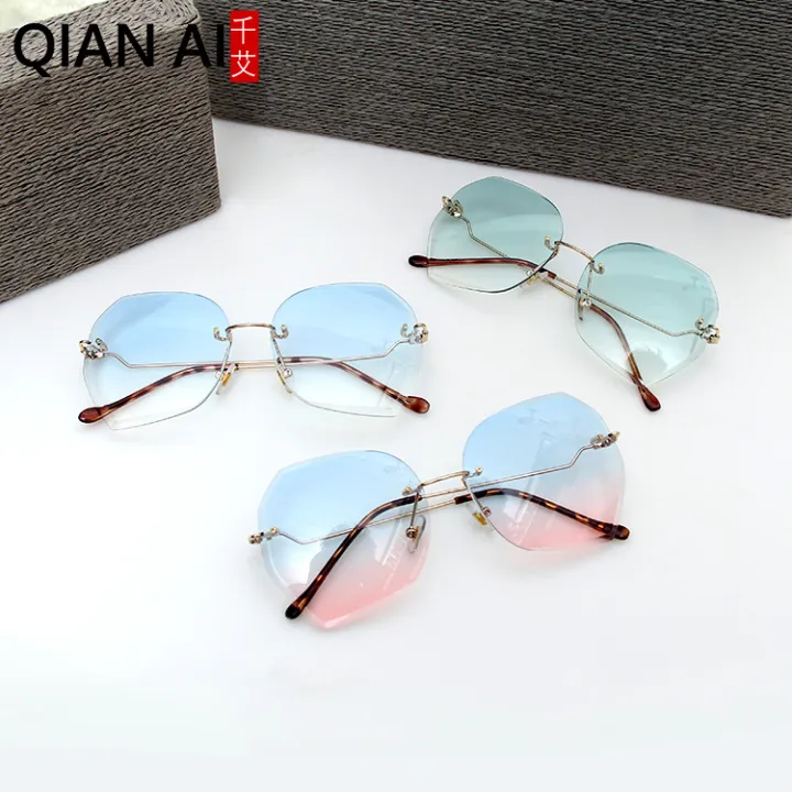 Qianai%20new%20fashion%20hipster%20cut%20edge%20sunglasses%20women's%20irregular%20fashion%20rimless%20ocean%20piece%20sunglasses%20driving%20mirrors%20-%20Image%204