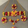 Artificial flower jewellery holud ornaments.