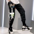 Fashion Swag Streetwear Men Reflective Hop Loose Cargo Pants Male Joggers Graffiti Ribbon Linen Pants Techwear Trousers. 