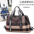Korean Large Capacity Travel Bag Short Business Trip Luggage Bag Women 'S Handheld Lightweight Storage Bag Waterproof Fashion Travel Bag. 
