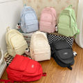 Niche simple backpack, female college student, junior high school student, girl, Japanese bubble lattice, high-value cream school bag. 