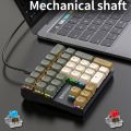 HXSJ 33 Key Wired Mechanical Numeric Keypad with Multi-color Lights Suitable for Finance Business Laptop Numeric Keyboard. 