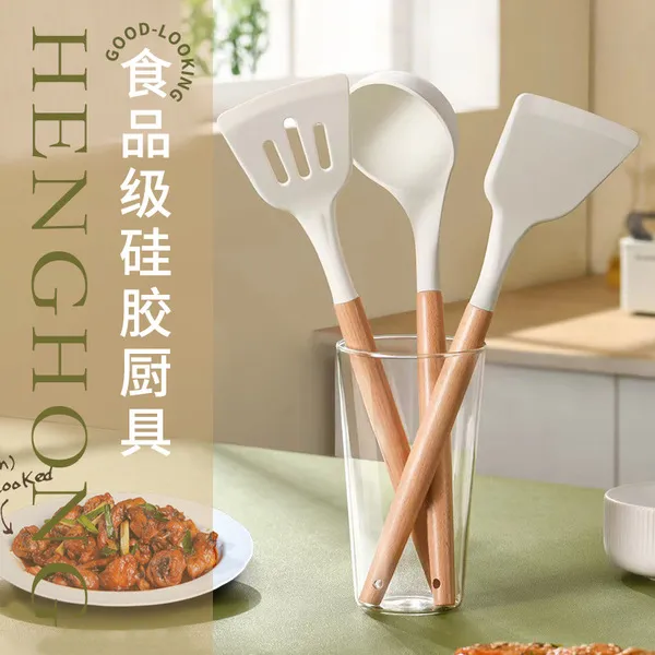 High-Quality%20Silicone%20Kitchen%20Utensils%20Set%20with%20Wooden%20Handle%20for%20Frying,%20Omelet,%20Cooking,%20and%20Serving%20-%20Image%202