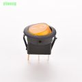 220v AC Round Rocker Switch with Orange Light Illumination. 