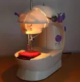 Portable Mini Electric Sewing Machine. 