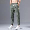 Stylish Casual Pants Mid-waisted Men Clothing Polyester Korean Style Men Ankle Tied Joggers Pants.