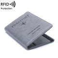 Multi-Compartment Travel Passport Wallet with Card, Ticket and SIM Slots, and Elastic Strap and RFI-D Blocker.