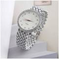 Fashion Quartz Watch for Women Casual Wristwatch with White Dial And Gold Frame.